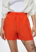 MANGO - Shorts lim - dark orange