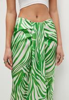 VELVET - Printed satin wrap over skirt - animal mono green