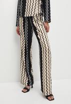 VELVET - Co-ord pull on printed trouser - black & white zigzag