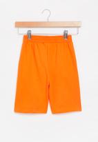 POP CANDY - Boys graphic fleece shorts - orange