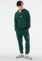 New Balance  - Nb essentials magnify fleece hoodie - nightwatch green