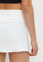 Blake - Front pleat mini skirt - white