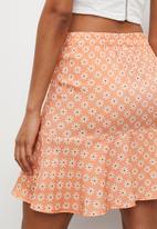 Blake - Core print a-line skirt - small daisy print canteloupe