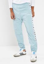 adidas tnt tape pants light blue