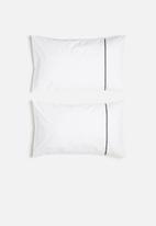 Sheraton Textiles - Eclipse embroidered pillowcase set - white & black