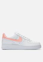 nike air force with pink tick