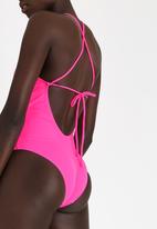 Lithe - Halter One Piece with Low Back Mid Pink