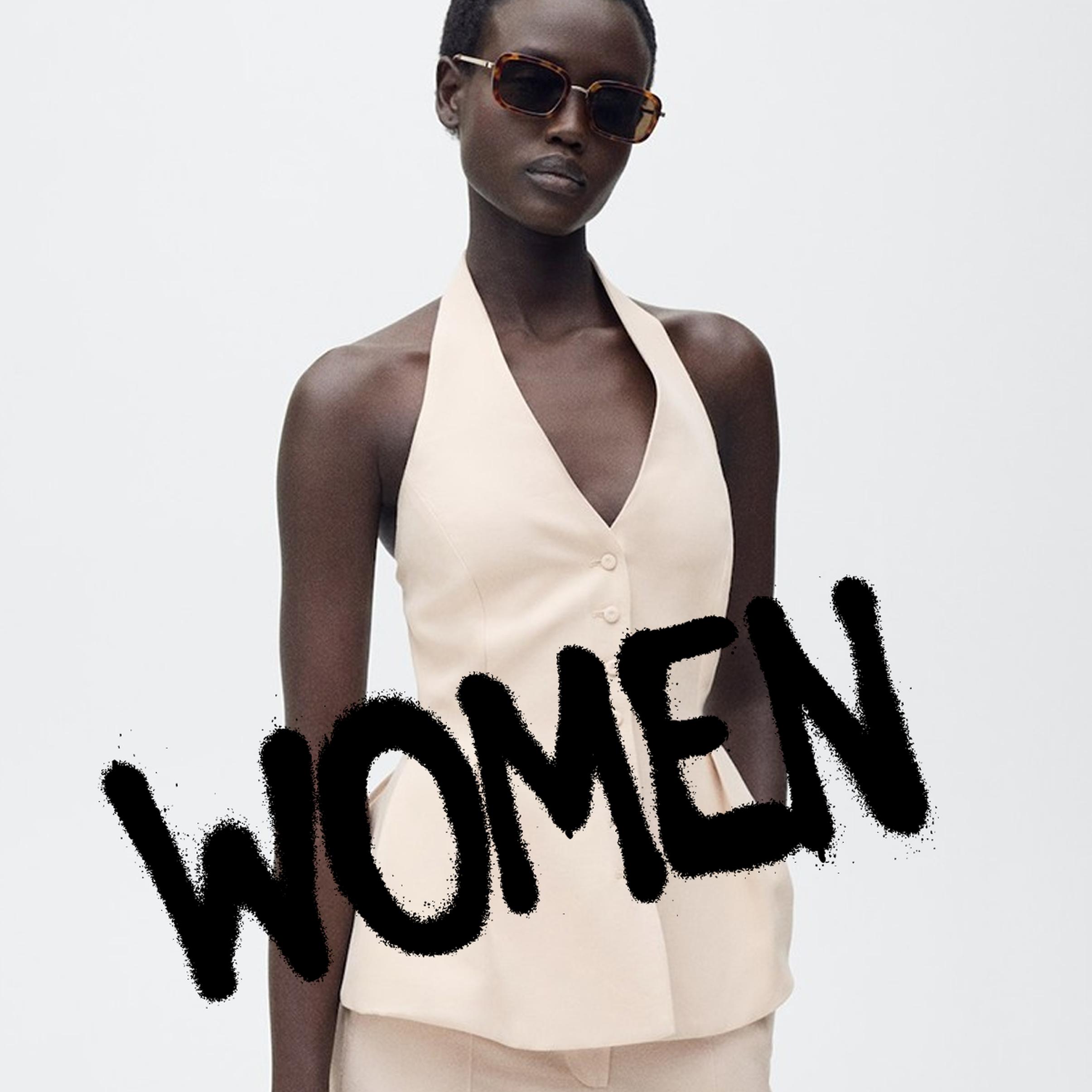 Woman in cream halter vest and sunglasses on a white background, overlaid with bold black “WOMEN” text for the Black Friday women’s deals section.