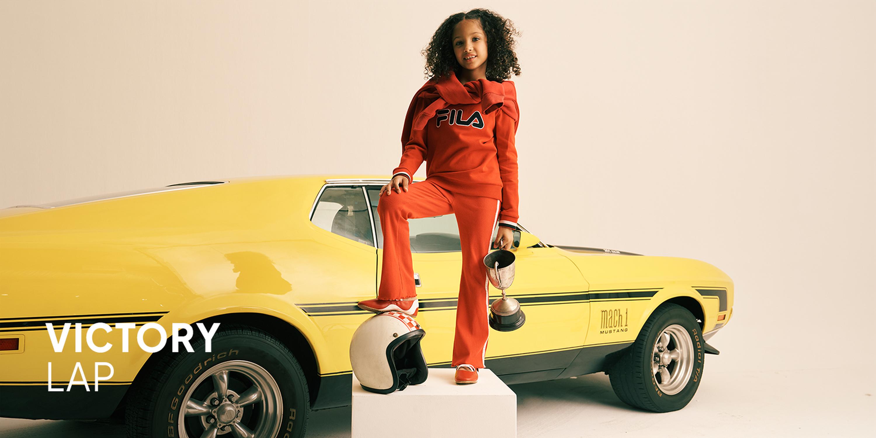 Kids' Cool Kid fashion campaign showcasing a light wash denim utility jacket, matching wide-leg jeans, a bucket hat, and pink trainers.