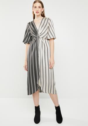 Knot front crossover dress - black & cream