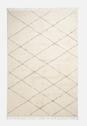 Raven tufted rug - cream