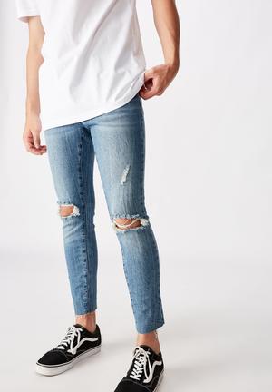 Raw hem skinny leg jean - bright indigo