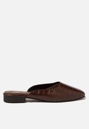 tyra chunky flatform mule trainer