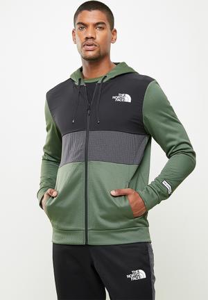 white and grey north face fleece