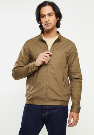 white and black polo jacket