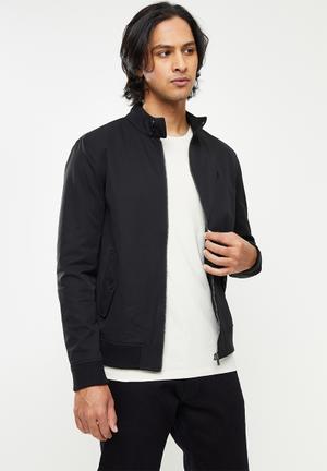 white and black polo jacket