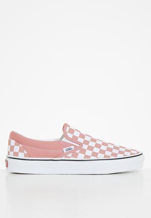 pink and black checkerboard slip on vans