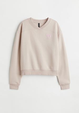 H&M+ Oversized motif-front sweatshirt - Light grey marl/Giants