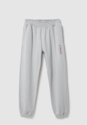 RICH MNISI x H&M: Relaxed fit cotton joggers - grey
