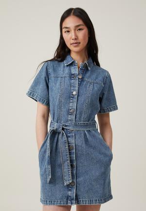 Calvin Klein Jeans strapless denim mini dress in mid wash
