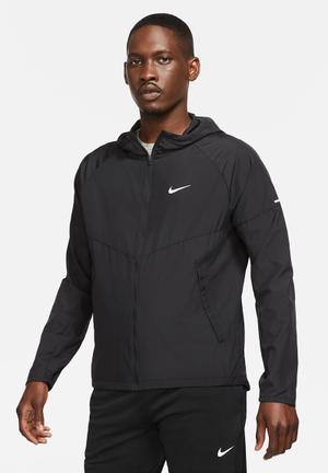 Nike Just Do It zip-through windbreaker jacket in tropical leaf print | ASOS