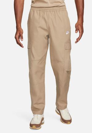 Nike Trend woven baggy parachute pants in light blue