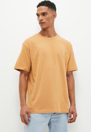 ASOS DESIGN oversized t-shirt in beige with front statue print