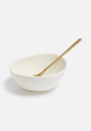 White bowl & gold spoon