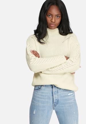 Ribbed funnel neck knit