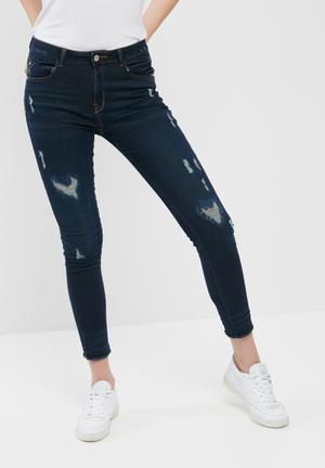 Anarchy mid rise ripped skinny jeans