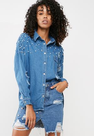 Distressed denim shirt with pearl detail