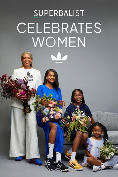 GIVE HER, HER FLOWERS: A HISTORY OF BLOSSOMS AND VICTORY