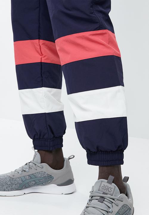 Asics Tiger - CB windbreaker pants - navy