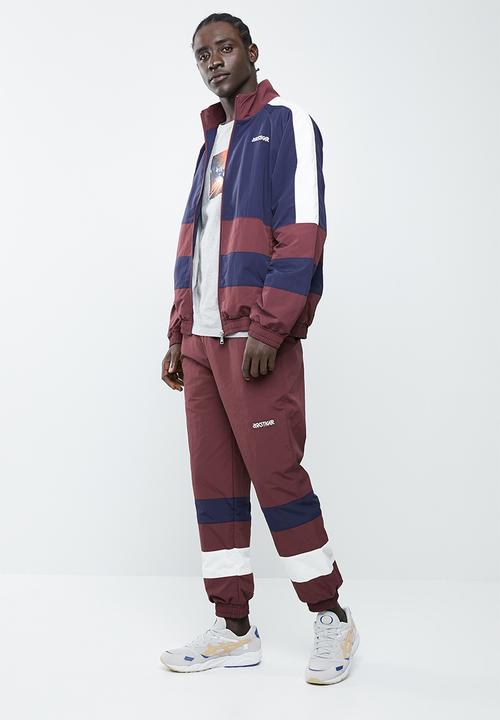 Asics Tiger - CB windbreaker pants - burgundy