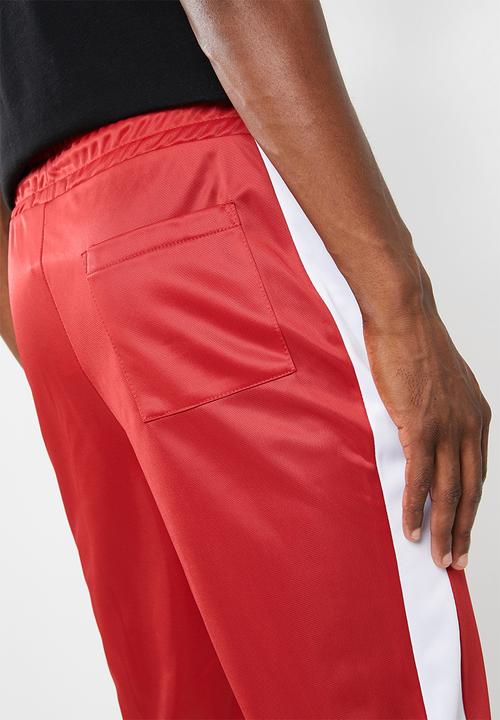 Superbalist - Slim side stripe tricot pant - red and white