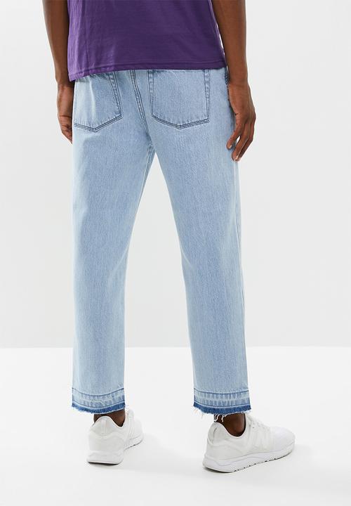 Superbalist - Cropped regular tapered released hem jeans - blue