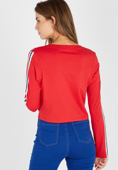 Supré  - Printed long sleeve loose crop - red