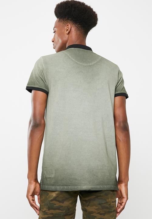 S.P.C.C - Dirty dye pique golfer with binding - green & black 