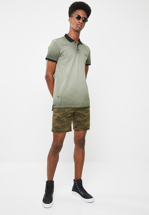 S.P.C.C - Dirty dye pique golfer with binding - green & black 