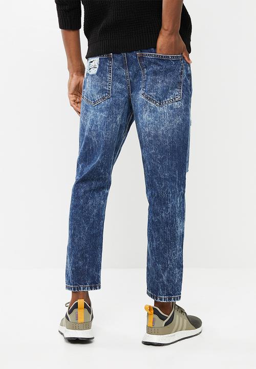 Superbalist - Regular tapered cropped ripped jeans - blue