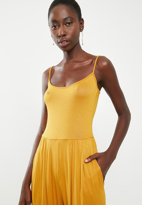 Superbalist - Strappy yoga jumpsuit - yellow