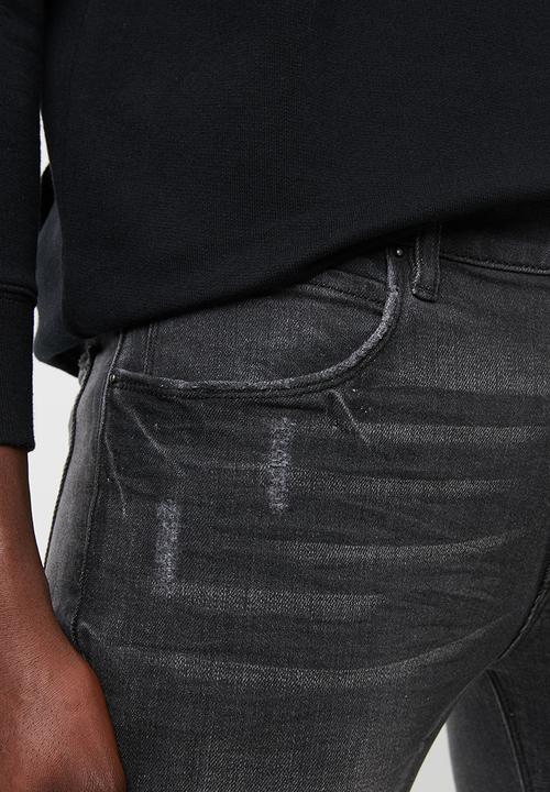 Superbalist - Skinny jeans with released hem - black