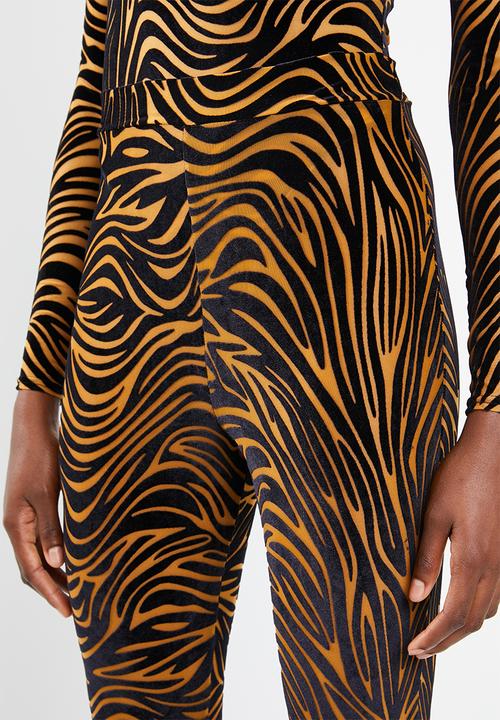 Missguided - Zebra velvet flare trousers - brown