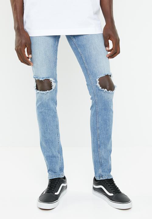 blue knee cut jeans