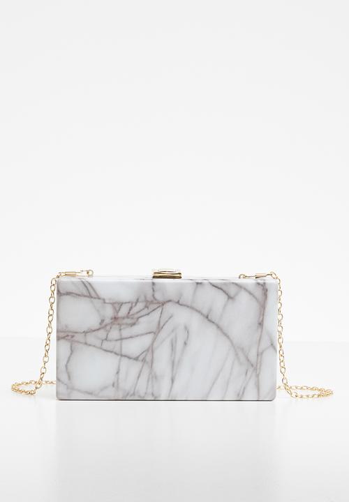 white clutch bag with strap