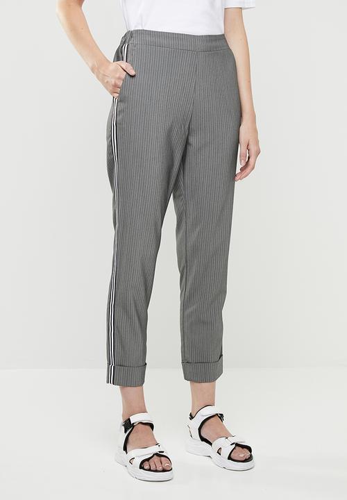 grey trousers with stripe