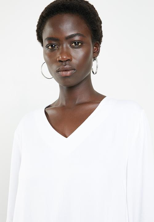 Revenge - Bell sleeve dip hem top - white