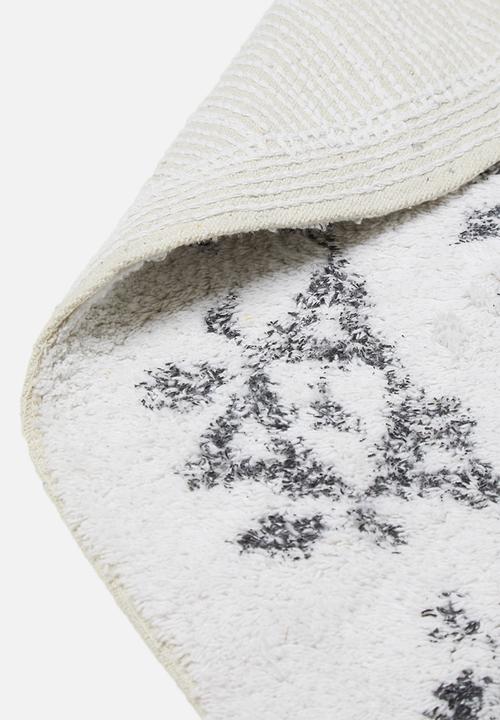 Sixth Floor - Sonja round tufted rug - white & black