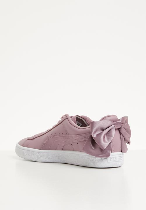 white puma trainers with ribbon