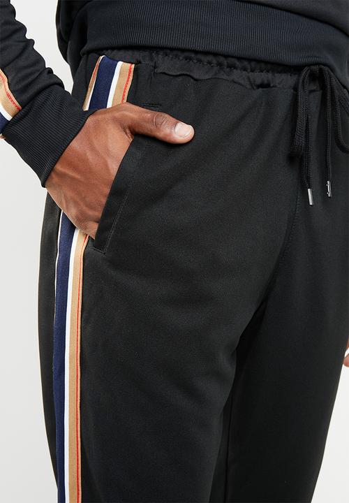 Cotton On - Slim ribbed tape tricot track jogger - black